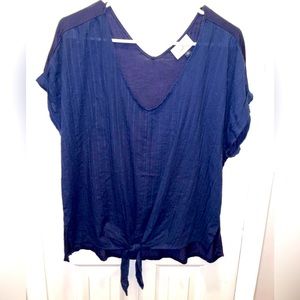 Navy blue tie in front blouse.